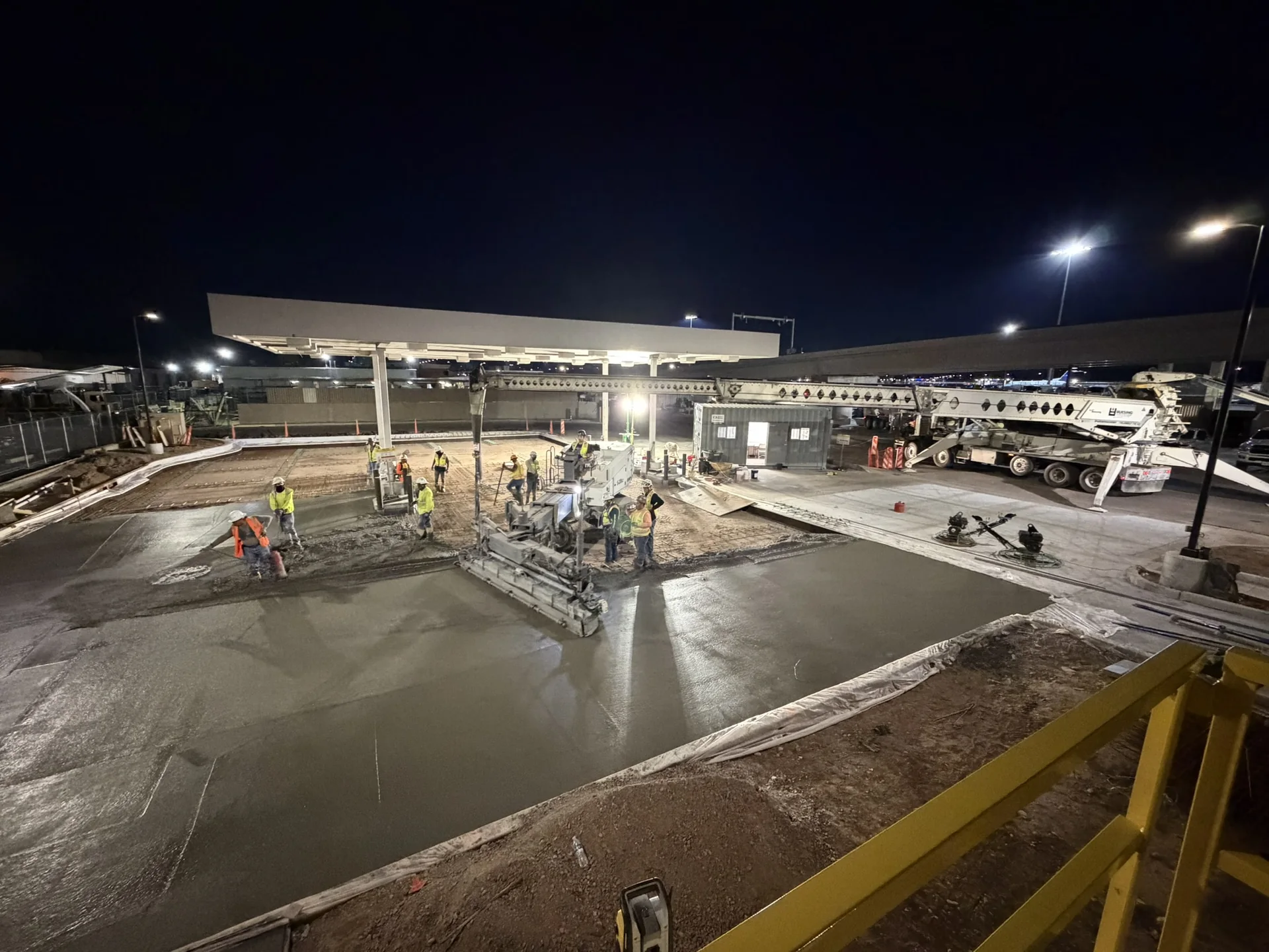 Raincon crews performing nighttime concrete work